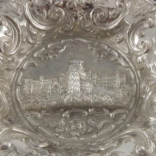 90 - An early Victorian silver castle top basket, Nathaniel Mills, Birmingham 1845, embossed in high reli... 