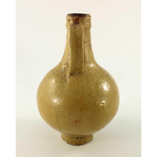 902 - A 17th century or earlier Bartmannkrug or Bellarmine jug, tope glazed with face mask above a floral ... 
