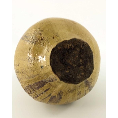 902 - A 17th century or earlier Bartmannkrug or Bellarmine jug, tope glazed with face mask above a floral ... 