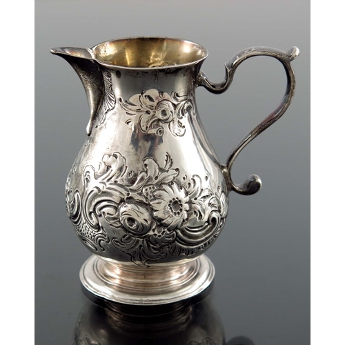 113 - A George II silver cream jug, William Coles, London 1739, baluster form with sparrow beak and S scro... 
