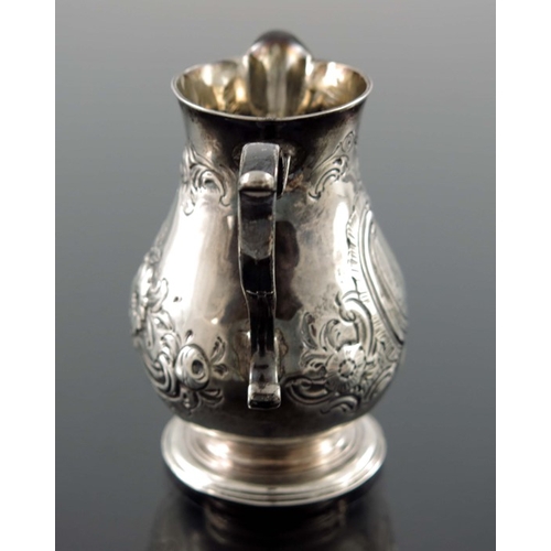 113 - A George II silver cream jug, William Coles, London 1739, baluster form with sparrow beak and S scro... 