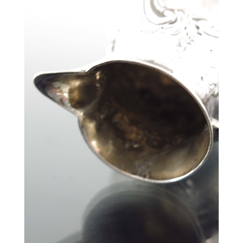 113 - A George II silver cream jug, William Coles, London 1739, baluster form with sparrow beak and S scro... 