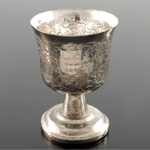 16 - A Chinese export silver goblet, MK circa 1890, the waisted cup body repousse decorated and chased wi... 