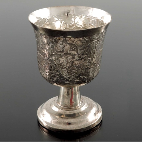 16 - A Chinese export silver goblet, MK circa 1890, the waisted cup body repousse decorated and chased wi... 