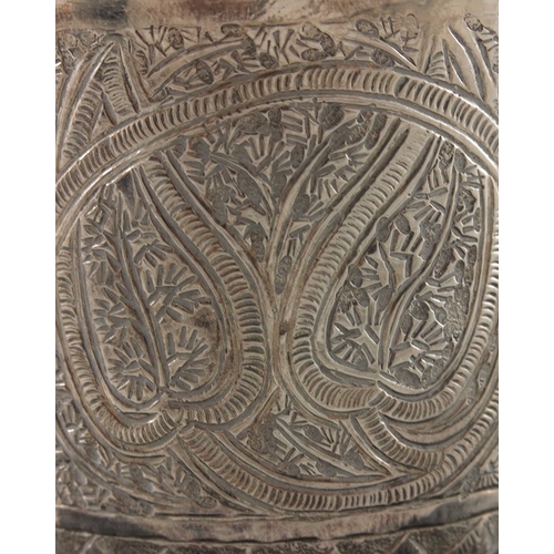 17 - A Chinese export silver goblet, TM, rounded beaker form with stepped foot, repousse embossed in the ... 