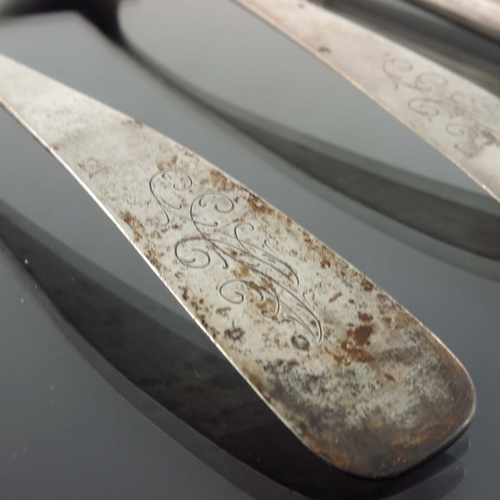 23 - A Latvian silver butter knife, CTB, Riga 1888, ogee edged spade blade, with hollow handle, together ... 
