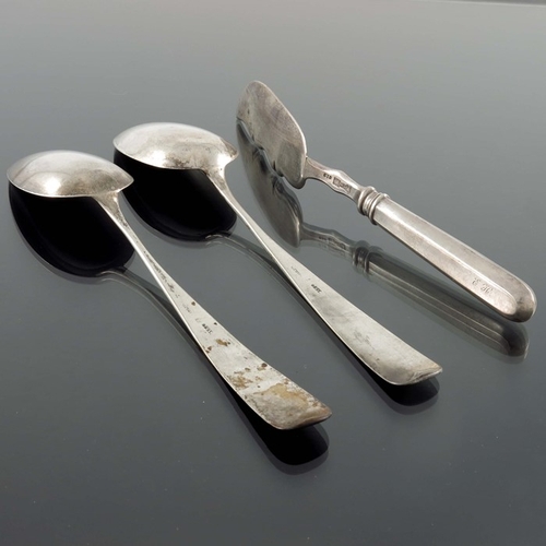 23 - A Latvian silver butter knife, CTB, Riga 1888, ogee edged spade blade, with hollow handle, together ... 