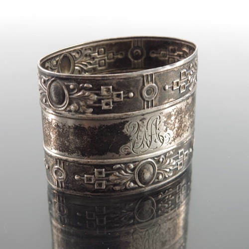 26 - An Imperial Russian silver match box case, together with a Continental silver napkin ring, Russian i... 