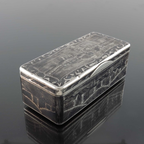 33 - An Imperial Russian silver and niello enamelled snuff box, Moscow 1852, cuboid form, decorated with ... 