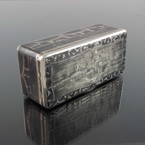 33 - An Imperial Russian silver and niello enamelled snuff box, Moscow 1852, cuboid form, decorated with ... 