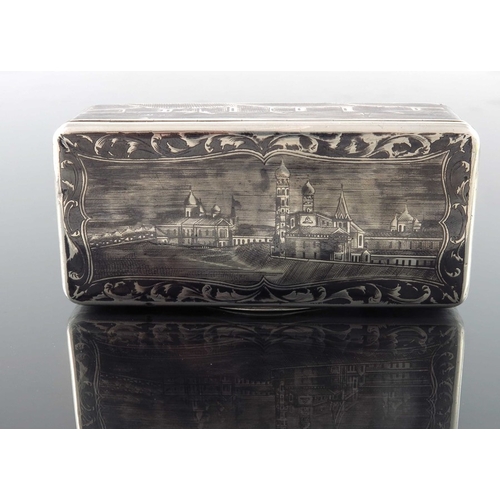 33 - An Imperial Russian silver and niello enamelled snuff box, Moscow 1852, cuboid form, decorated with ... 