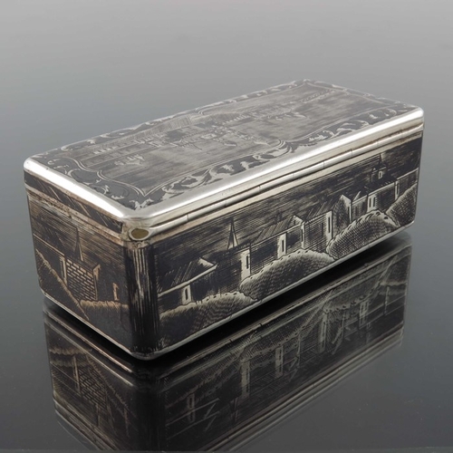 33 - An Imperial Russian silver and niello enamelled snuff box, Moscow 1852, cuboid form, decorated with ... 
