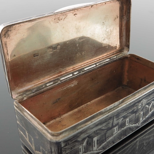 33 - An Imperial Russian silver and niello enamelled snuff box, Moscow 1852, cuboid form, decorated with ... 