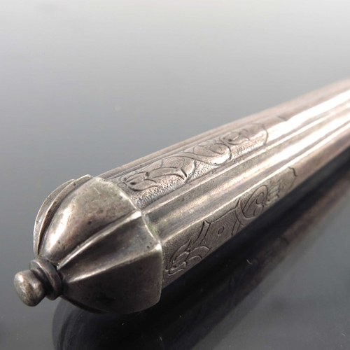 46 - A German silver handled knife and fork, IG, Nuremberg circa 1750, fluted and chased handles, with kn... 