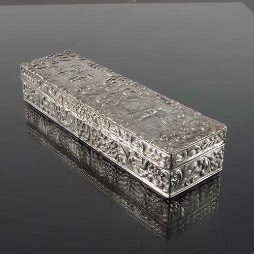 47 - A Dutch silver box, Amsterdam, cuboid form, embossed with village scenes within foliate scroll groun... 