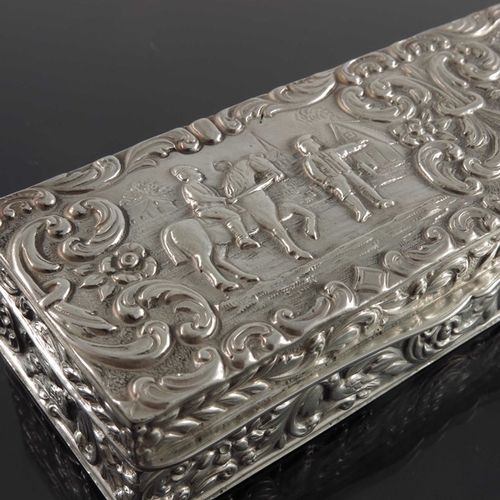 47 - A Dutch silver box, Amsterdam, cuboid form, embossed with village scenes within foliate scroll groun... 