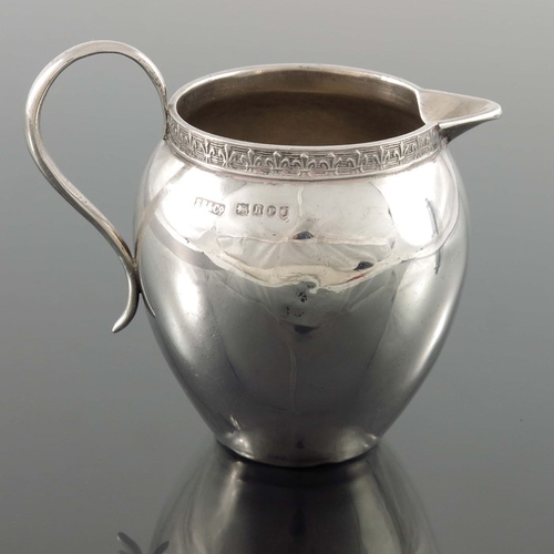 48 - A Dutch silver jug, import marks, Singleton, Benda & Co., London 1903, shouldered ovoid form with ch... 