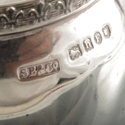 48 - A Dutch silver jug, import marks, Singleton, Benda & Co., London 1903, shouldered ovoid form with ch... 