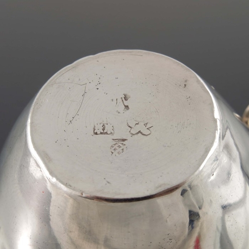 48 - A Dutch silver jug, import marks, Singleton, Benda & Co., London 1903, shouldered ovoid form with ch... 