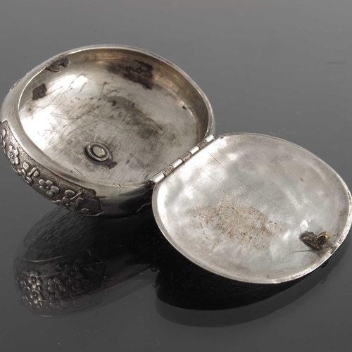5 - A Chinese silver snuff box, 19th century, oval form, engraved and chased with prunus within ogee car... 