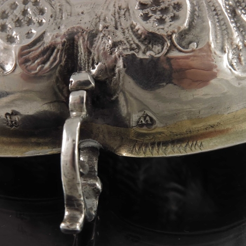 50 - A 17th century German silver and parcel gilt twin handled wine taster or dish, Paul Hedel Hofer, Bre... 