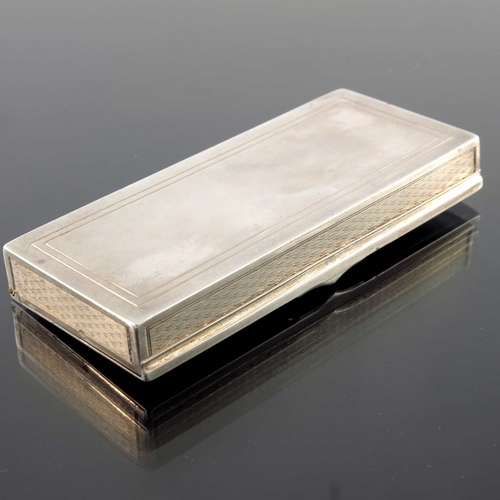 53 - A French silver snuff box, circa 1890, rectangular section, engine turned and chased with floral gar... 