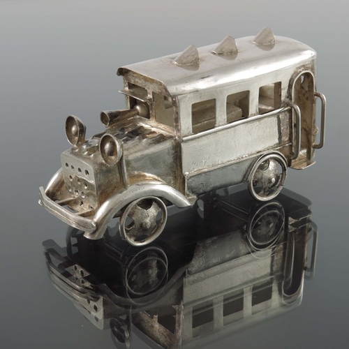 9 - A Chinese export silver novelty model of a bus, YLS, sheet and wire construction with movable wheel ... 