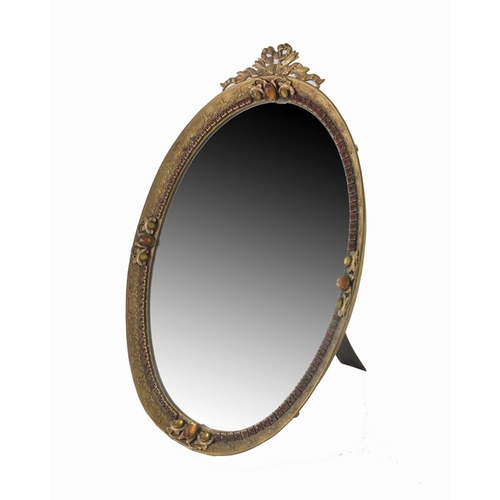 337 - A 19th century French gilt brass and paste set mirror, bevelled oval form, tooled and chased with ri... 