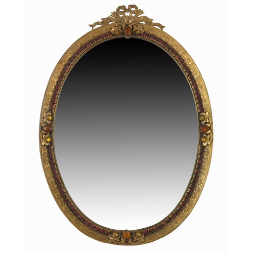 337 - A 19th century French gilt brass and paste set mirror, bevelled oval form, tooled and chased with ri... 