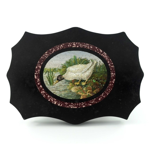338 - A 19th century micro mosaic paperweight, the central oval with a duck at the edge of a pond, within ... 