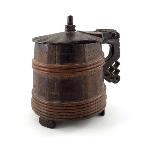 340 - An 18th century Scandinavian peg tankard, willow-bound and chip-carved with geometric motifs, hinged... 
