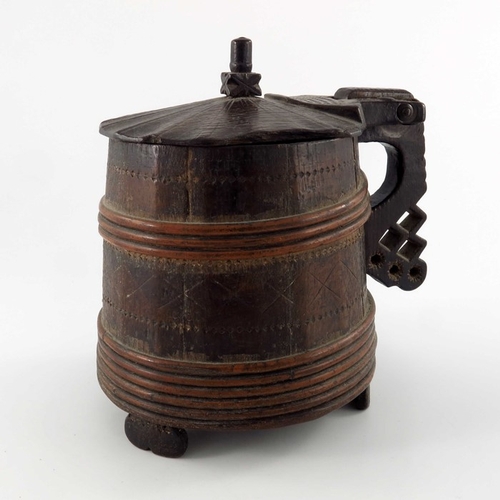 340 - An 18th century Scandinavian peg tankard, willow-bound and chip-carved with geometric motifs, hinged... 