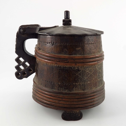 340 - An 18th century Scandinavian peg tankard, willow-bound and chip-carved with geometric motifs, hinged... 