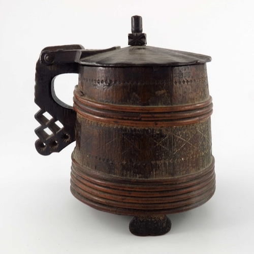 340 - An 18th century Scandinavian peg tankard, willow-bound and chip-carved with geometric motifs, hinged... 