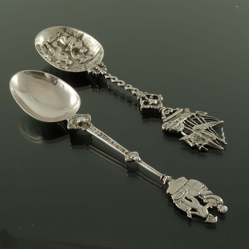 Two Dutch silver spoons, cast and chased with Renaissance style handles,  the terminals galleon and d