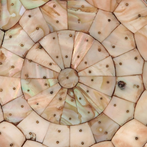 495 - An Indian mother of pearl dish, possibly Gujarat, circular form with jagged edge rim, pinned section... 