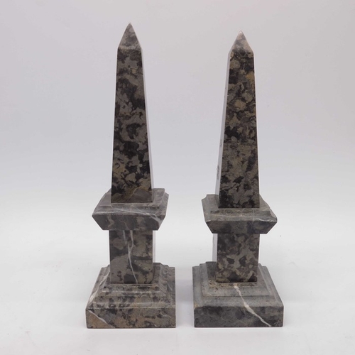 38 - A pair of marble obelisks. square sectional form  on stepped bases, 40cm high  (2)