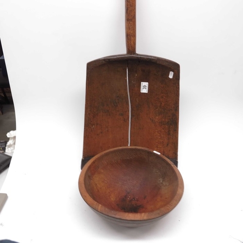 39 - A 19th Century wooden grain shovel with iron work edge and D shaped handle, 102cm length, and a turn... 