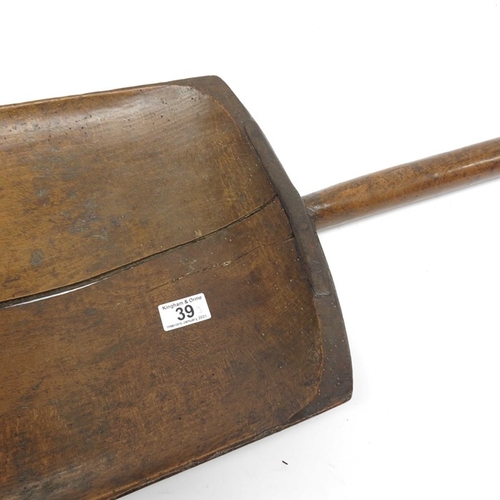 39 - A 19th Century wooden grain shovel with iron work edge and D shaped handle, 102cm length, and a turn... 