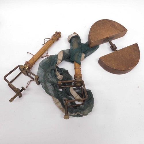 74 - Two pairs of wooden shoe stretchers, a hat jack, a vintage table tennis net and a pair of faux book ... 