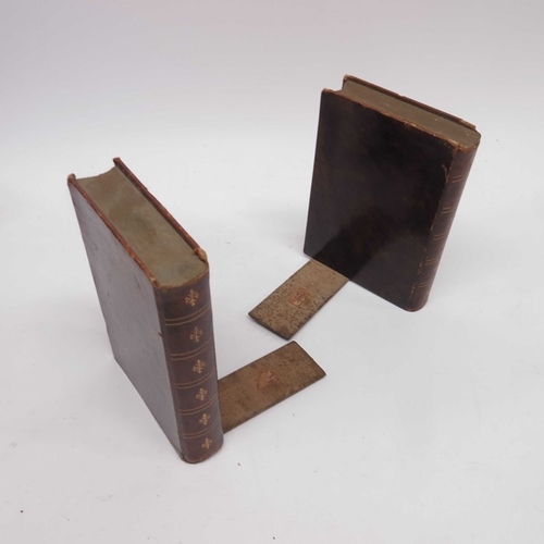 74 - Two pairs of wooden shoe stretchers, a hat jack, a vintage table tennis net and a pair of faux book ... 