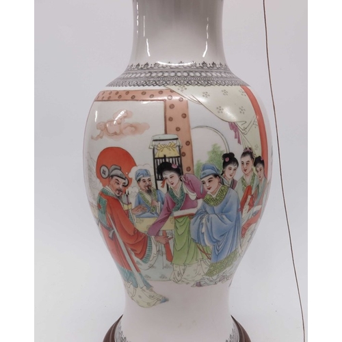 83 - A Chinese republic porcelain vase, baluster form with flared neck, decorated with figures and script... 