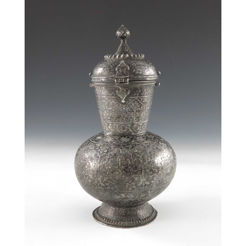 6 - An 18th century or earlier Indian Mughal silver and niello enamel ewer or chuski, bulbous form with ... 