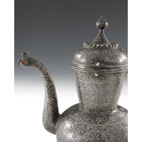 6 - An 18th century or earlier Indian Mughal silver and niello enamel ewer or chuski, bulbous form with ... 