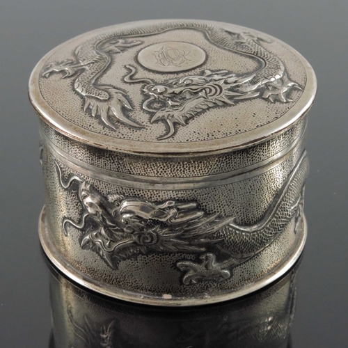 19 - A Chinese export silver box and cover, Tuck Chang, Shanghai circa 1900, circular drum form, embossed... 