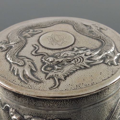 19 - A Chinese export silver box and cover, Tuck Chang, Shanghai circa 1900, circular drum form, embossed... 