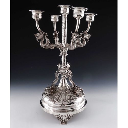 20 - A Chinese silver five light candelabrum, Wang Hing, Hong Kong circa 1900, the lobed circular base em... 