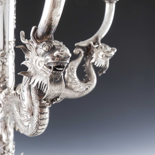 20 - A Chinese silver five light candelabrum, Wang Hing, Hong Kong circa 1900, the lobed circular base em... 