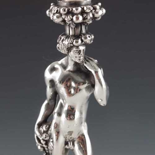 30 - A Christofle silver plated figural candlestick, modelled as Bacchus, on circular base, stamped marks... 