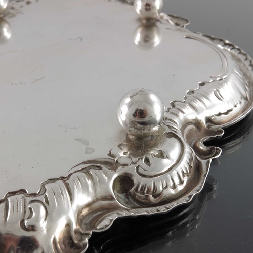 31 - A German silver card tray, Franz Mosgau, Berlin circa 1890, Rococo cartouche form, embossed and chas... 